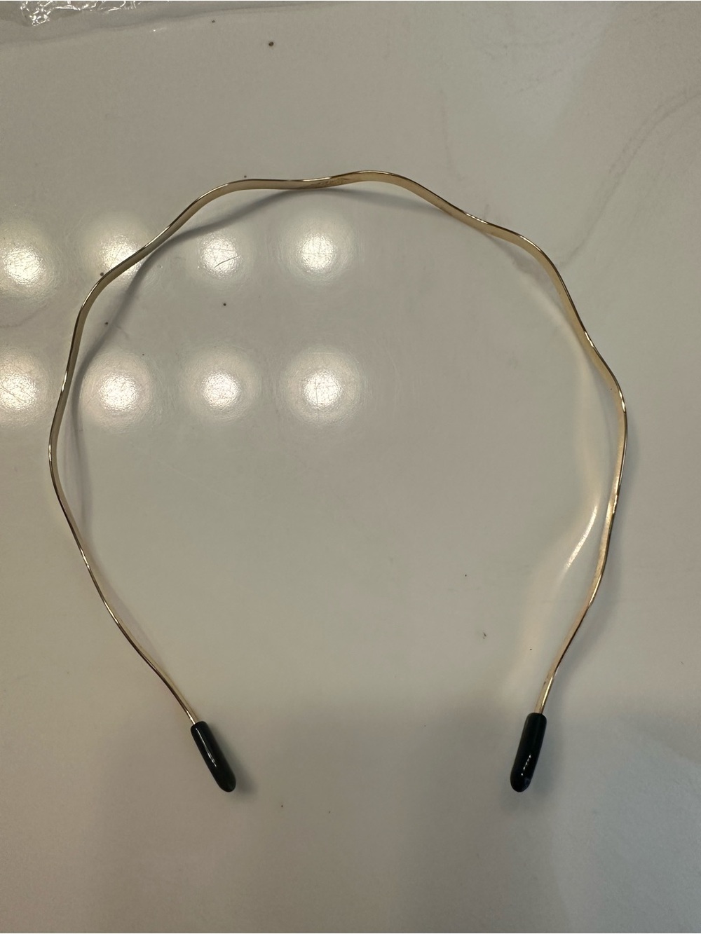Gold Tone Wire Headband with Black Tips